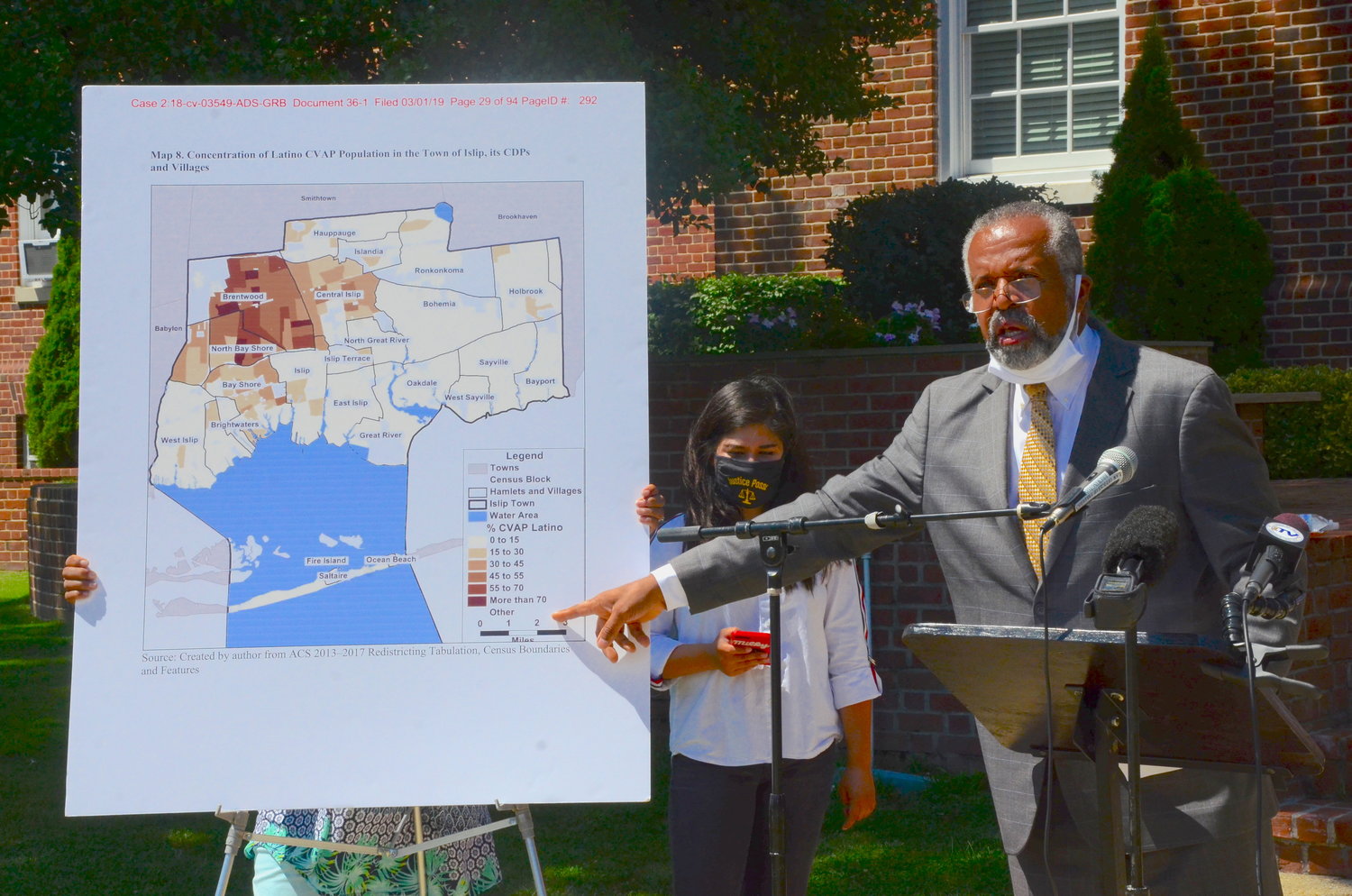 Hempstead civil rights attorney Frederick Brewington discusses the case at a press conference in front of Islip Town Hall Friday, July 31, one day after Hon. Gary Brown ordered the Town of Islip to federal court regarding the case.